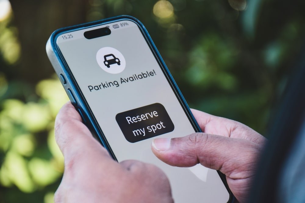 Man,Making,Parking,Reservations,For,His,Car,Online.,Vehicle,Parking